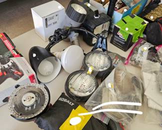 Lighting & Electrical Supplies Assorted light fixtures, work lights, bulbs and electrical accessories.
