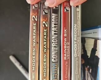 PlayStation 3 Video Games PS3 games including Call of Duty: Modern Warfare 2, SOCOM Confrontation, Rainbow Six Vegas 2 and Ghost Recon Advanced Warfighter 2.