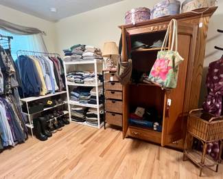 vintage wood wardrobe - many racks of clothing