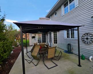 Only patio shelter is for sale not the table set
