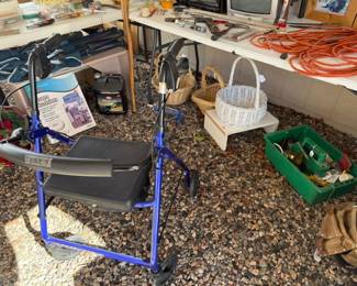 Walker with sitting stool and brakes