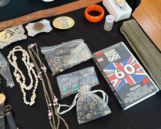 Beatles, VHS, ornate belt buckles, costume jewelry