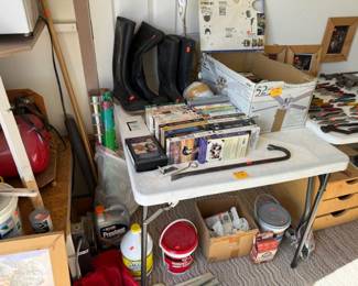 VHS tapes, chemicals, crow bar, rubber boots