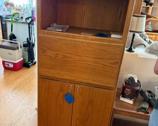 Unique desk and storage unit, has locks with keys