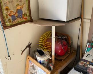 Small fridge, paintings, small compressor