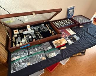 Lots of nice jewelry, watches, chains, coins
