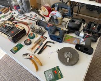Small power tools, long tape measure, camera, skill saw
