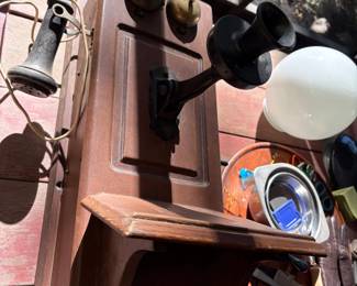 Antique wall telephone in the porch area 