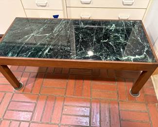 Wonderful green marble top coffee table with clean lines.