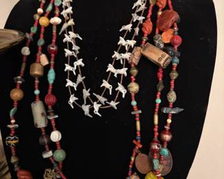 Cool multi-strand necklaces...fetishes and beads.