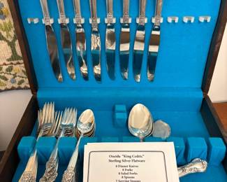 Another smaller set of sterling flatware