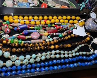 A tray of beautiful beads...tiger's eye, lapis, African, and more.