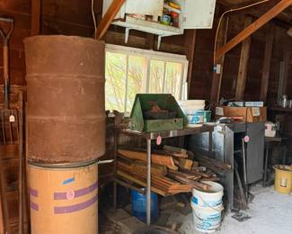 barrels, tools, camping stove