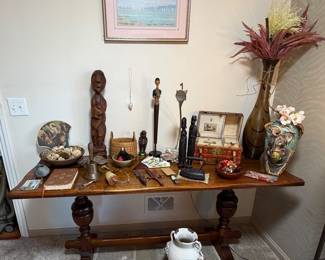 Orante Wooden Study Table/ Desk; Brass Hand Bell; Dagger; Tribal Statues; Antique Childs Trunk; Paper Accordian Hand Fans; Ornate Handmade Elephant Vase; Sad Iron; Decor