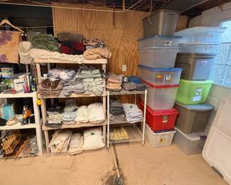 Shelving Units; Storage Totes; Blankets; King Sheets; King Mattress Pad; Towels (basement)