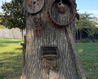 Metal Tree Art- Will be left on the tree (in back yard) until purchased- buyer will then remove