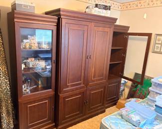 3 Piece Entertainment Center Good condition  Some very minor imperfections on base Sides are separate from center  Side pieces measure: 22” across x 18” deep x 73” tall Center piece measures: 46” across x 22” deep x 77” tall Must be able to move and load yourself