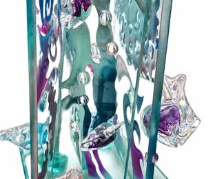 Etched glass fish sculpture on white