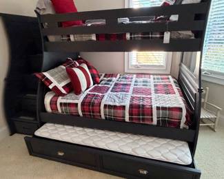 Bunkbeds, full-size below, single size upper, & trundle bed 