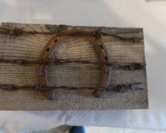 horseshoe and barb wire
