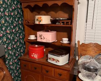 Small china hutch. Vintage MCM piece in near perfect condition for its age. Collectible vintage cake plates.