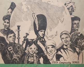 A lot of ephemera , including old books , postcards , old photographs , et cetera