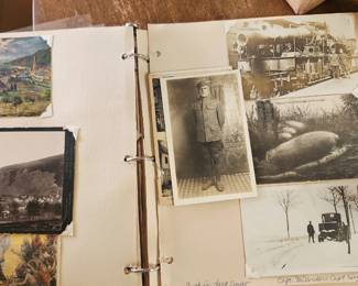 Several pages of the world war two scrapbook , being sold