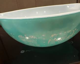 Vintage Pyrex turquoise Cinderella mixing bowl featuring the Butterprint farm motif, circa 1950s-1960s.