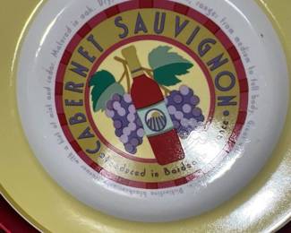 Round appetizer plate set featuring a Cabernet Sauvignon wine-themed central graphic with a bottle and grape clusters.