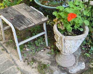 Wooden slat garden stool with metal frame and outdoor planters