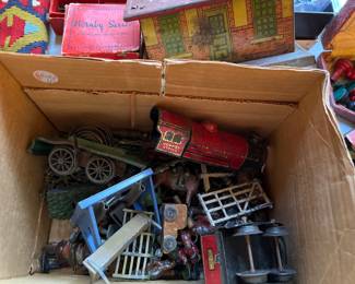 Collection of vintage miniature toy train components