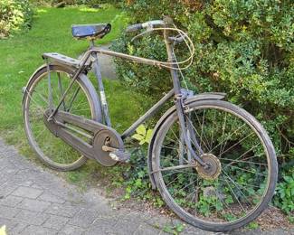 pre-World War II Raleigh Sport 3-speed with a 12-volt Dynohub generator in the front wheel.