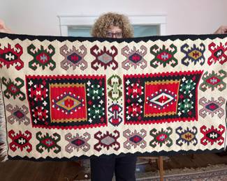 Vintage woven flatweave Kilim rug (model holding rug not included)