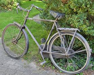 pre-World War II Raleigh Sport 3-speed with a 12-volt Dynohub generator in the front wheel. (Picture 2)