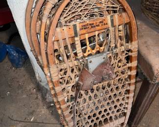 Vintage wooden "bear-paw" style snowshoes