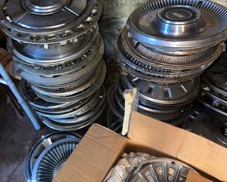 Various vintage wheel covers and hubcaps 