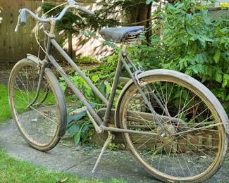 1955 Raleigh Dyno-Four, with a 4-speed rear hub and integral 6-volt Dynohub generator. (Picture 2)