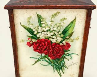 Vintage wooden storage box with hinged lid, carrying handle, and floral artwork featuring red carnations and white lily-of-the-valley. Aged finish.
