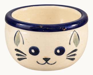 Ceramic Cat Bowl ◆ Cream-colored pottery bowl featuring a whimsical painted cat face, blue eyes, whiskers, and dark blue rolled rim.