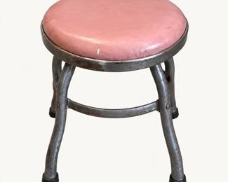 Metal Stool ◆ Round pink padded seat, tubular metal legs, and rubber feet.