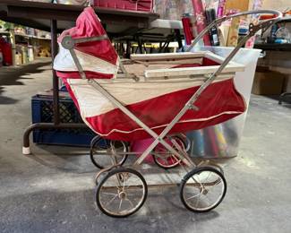 This child's doll buggy dates back to the 1950's.