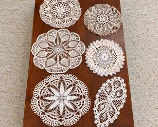 Vintage Crochet Doilies on Wooden Table