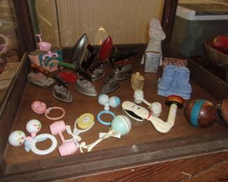 Baby Items, Vintage Irons, etc in Display Case