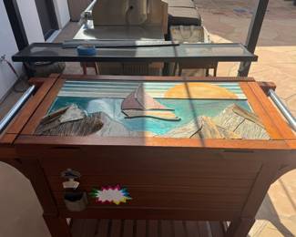 Lid on Tommy Bahama cooler is custom made