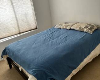 Bed With Blue Cover