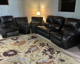 Five piece black l-shaped sectional.  The ends are recliners.  Presale $395