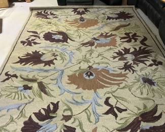 7x10 foot rug in ran, brown, ruequoise and some green colors.  Presale 150