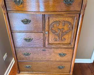 Chest of drawers with hat door