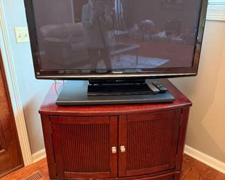 Corner tv stand.  55” tv