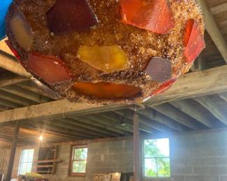 This is a vintage mid-century chunky Lucite and resin "rock candy" or mosaic swag lamp (often associated with makers like the House of Mosaics of California).